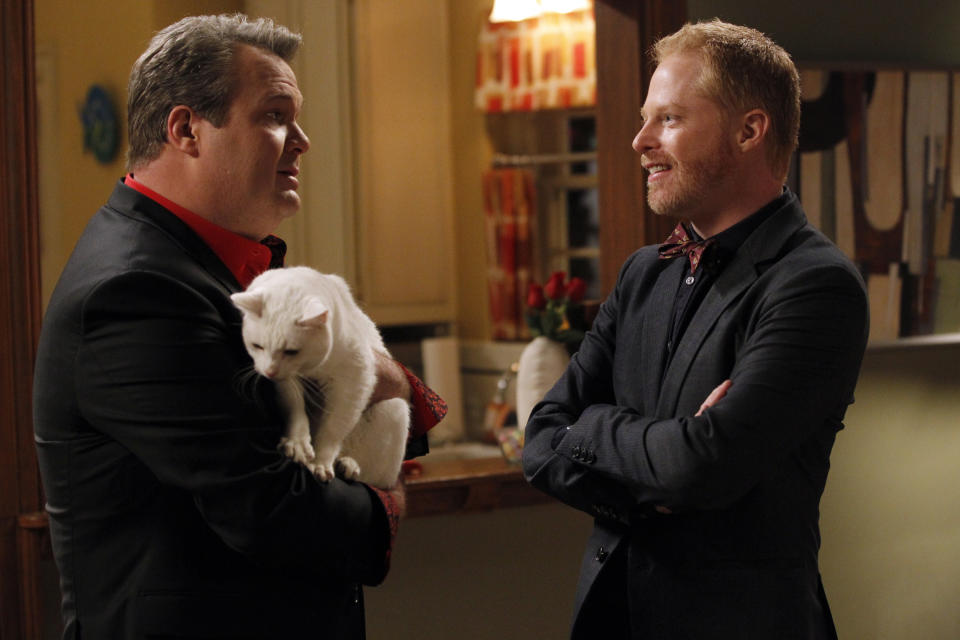This image released by ABC shows Eric Stonestreet, left, and Jesse Tyler Ferguson in a scne from "Modern Family." (AP Photo/ABC, Peter "Hopper" Stone)