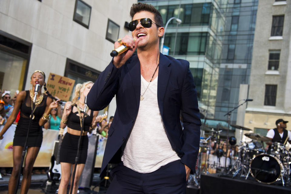 FILE - In this July 30, 2013 file photo, Robin Thicke performs on NBC's "Today" show in New York. Thicke's single "Blurred Lines," featuring T.I. and Pharrell is one of the top songs of the summer. (Photo by Charles Sykes/Invision/AP, File)