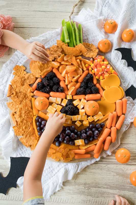 <p>Freutcake</p><p>Grab your kid’s favorite orange and “black” foods and make an easy jack-o'-lantern snack board for the perfect Halloween snack!</p><p><strong>Get the recipe: <a href="https://www.freutcake.com/halloween/jack-o-lantern-snack-board/" rel="nofollow noopener" target="_blank" data-ylk="slk:Jack-O'-Lantern Snack Board;elm:context_link;itc:0;sec:content-canvas" class="link rapid-noclick-resp">Jack-O'-Lantern Snack Board</a></strong></p>