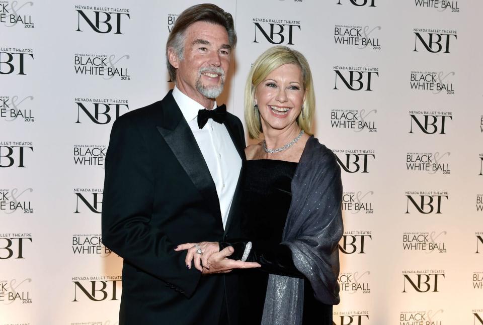 LAS VEGAS, NV - JANUARY 23: Entertainer Olivia Newton-John (R) and her husband, John Easterling, attend Nevada Ballet Theatre's 32nd annual Black &amp; White Ball honoring her at Wynn Las Vegas on January 23, 2016 in Las Vegas, Nevada. (Photo by David Becker/Getty Images)