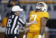 Tennessee defensive lineman Omari Thomas (21) reacts after making a tackle for a safety during the first half of the team's NCAA college football game against Mississippi on Saturday, Oct. 16, 2021, in Knoxville, Tenn. (AP Photo/Wade Payne)