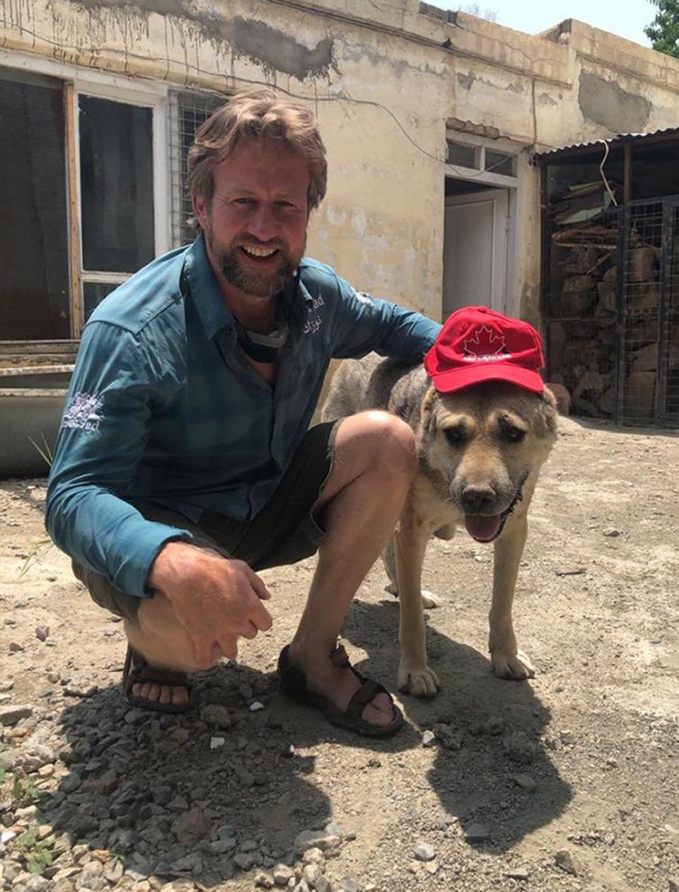 A leading animal welfare activist campaigning to get a British veteran out of Afghanistan has urged the UK and US governments to ‘get a grip’ on the ‘anarchy’ still unfolding at Kabul airport (Handout/PA) (PA Media)