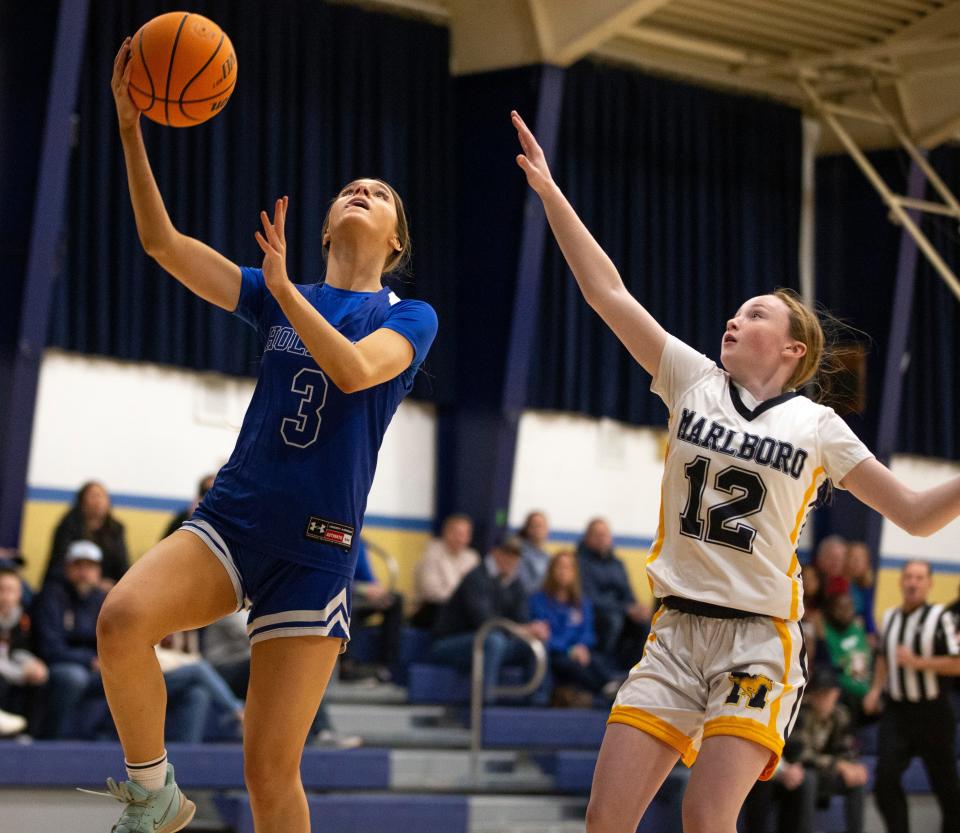 Holmdel’s #3 Allison Cannon drives to the hoop. Marlboro vs Holmdel girls basketball at St. Mary’s. 
Middletown, NJ
Friday, December 15, 2023