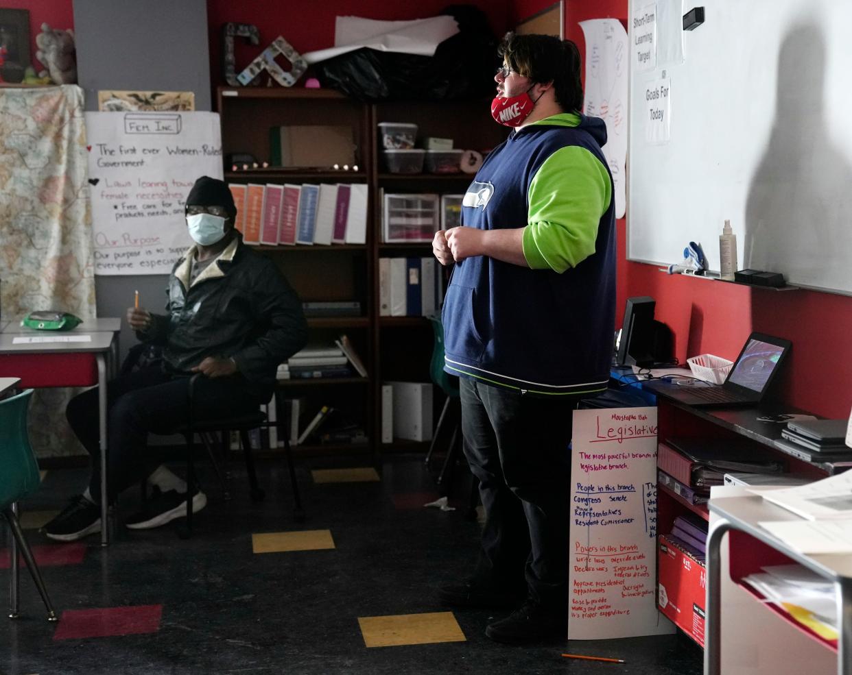 Ethan Frazier, 17, teaches a lesson on the Articles of Confederation for his Walkabout experience at the Graham School. The program works like an internship where students spend at least three days a week at their placement.