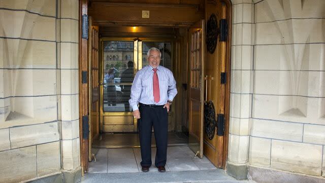 Former Nunavut Senator Willie Adams stands outside the Senate building in Ottawa in 2009.  (Photo submitted by Mary Hands  - image credit)