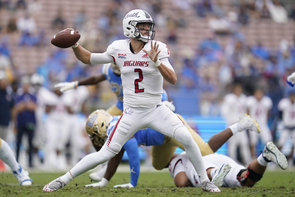 FILE - South Alabama quarterback Carter Bradley (2) throws during the first half of an NCAA college football game against UCLA in Pasadena, Calif., Saturday, Sept. 17, 2022. South Alabama opens their season at Tulane on Sept. 2. (AP Photo/Ashley Landis, File)