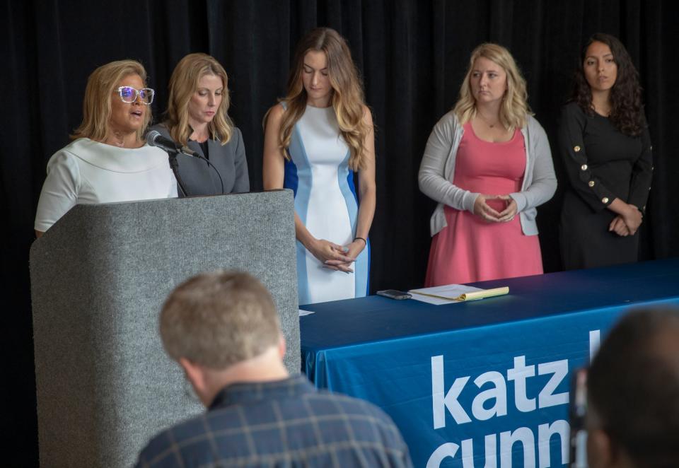 Mara Candelaria Reardon (left), Kimberly Jeselskis, of Katz Korin Cunningham, and Reardon's co-plaintiffs Niki DaSilva, Gabrielle McLemore, and Samantha Lozano attend a press conference to lay out the basics of a lawsuit filed against the State of Indiana and Curtis Hill, Indiana Attorney General, Indianapolis, Tuesday, June 18, 2019. The several-faceted lawsuit includes alleged sexual harassment, gender discrimination, and retaliation for reporting these situations. 