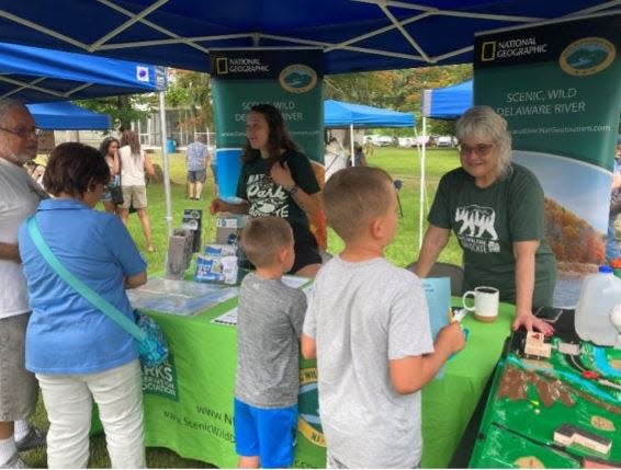 Young visitors learning about the importance of the Delaware River Watershed at the 16th Zane Grey Festival in Lackawaxen, PA.