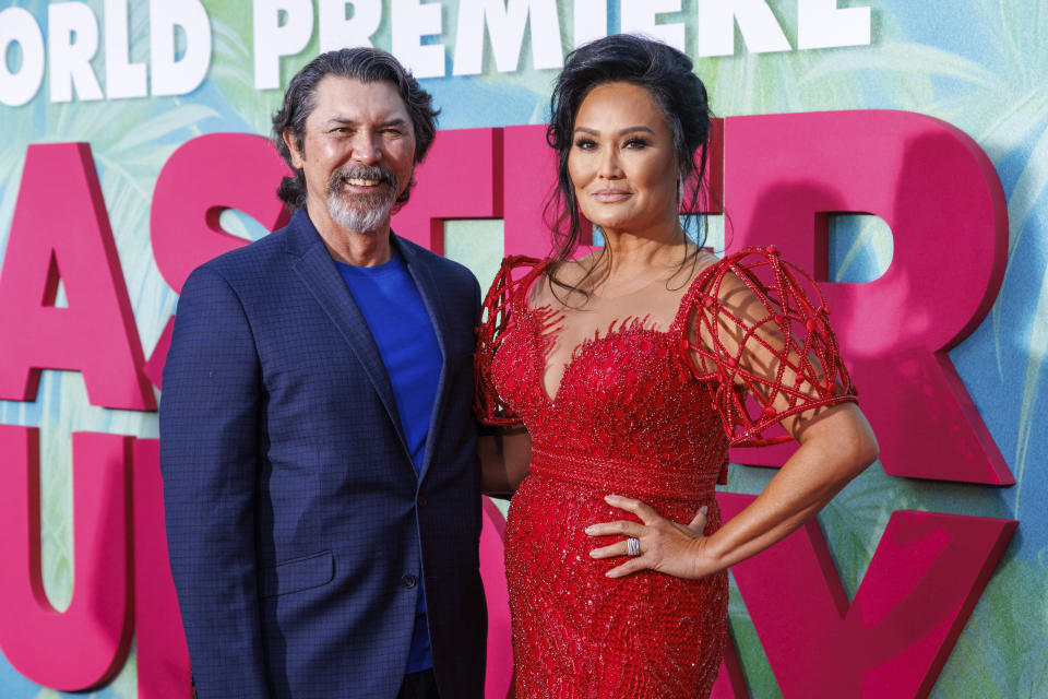 Lou Diamond Phillips, left and Tia Carrere arrive at the World Premiere of 