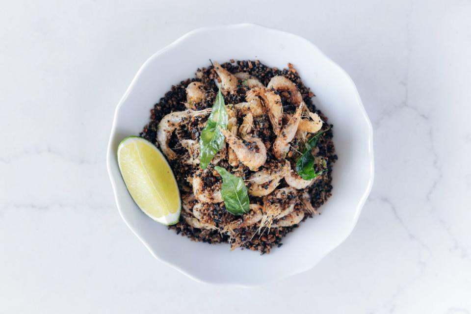 A bowl of small shrimp and spices