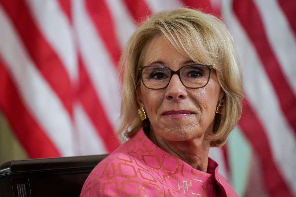 Education Secretary Betsy DeVos listens during an Aug. 12 White House meeting about reopening schools during the pandemic