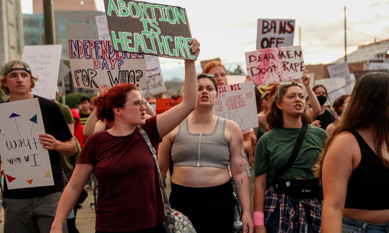 <span>Abortion rights activist protests during a Pro Choice rally near the Tucson federal courthouse in Tucson, Arizona, July 4, 2022.</span><span>Photograph: Sandy Huffaker/AFP/Getty Images</span>