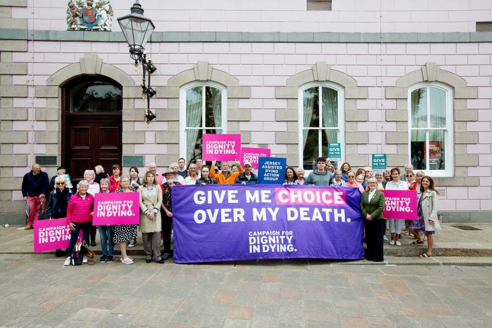 Protesters while States of Jersey Government Ministers were entering the States Assembly building to debate the Assisted Dying Law on Wednesday (Christian Keenan /PA Wire)