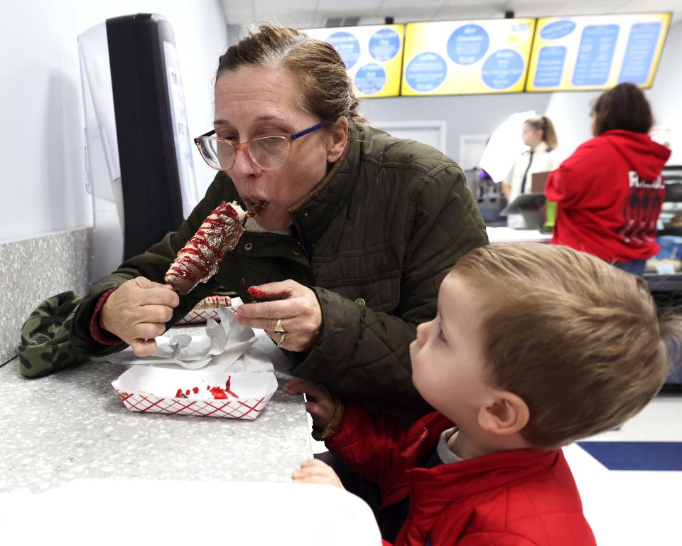 Maria Bilikas, Cambridge, with her grandson Leon Carreiro, 1, of Middleboro, at The Flying Banana located at 54 Center St. in Middleboro on Friday, Dec. 1, 2023.