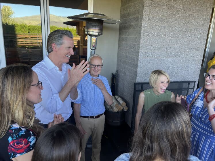 Gov. Gavin Newsom speaks with supporters at a private fundraiser in Boise, Idaho.