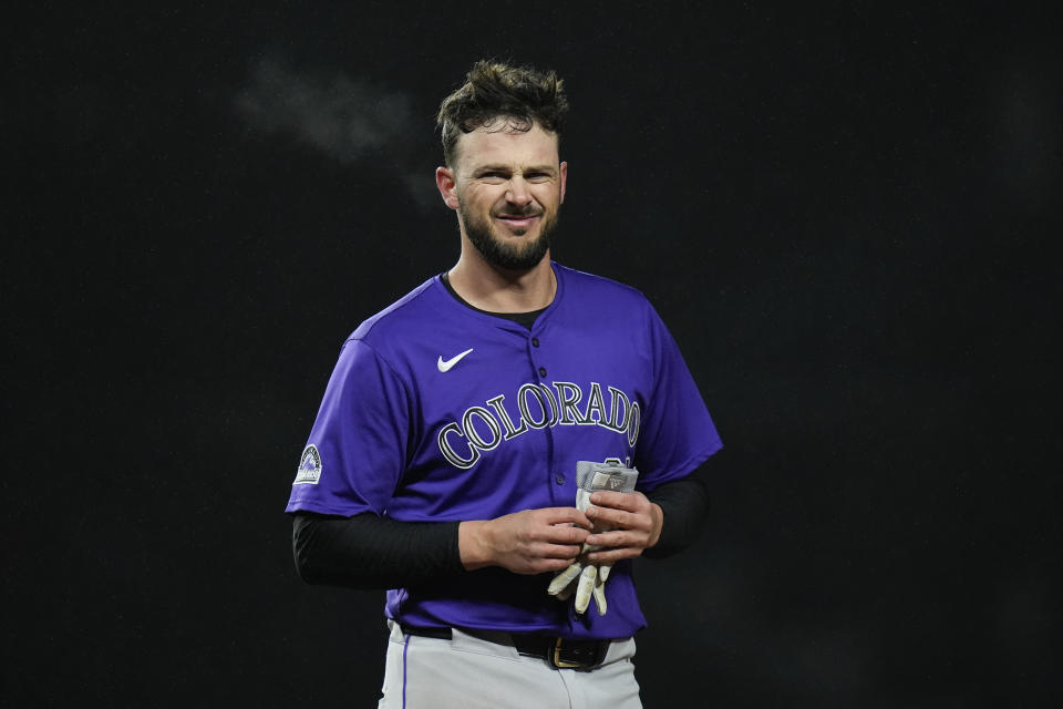 Colorado Rockies right fielder Kris Bryant's breath can been seen during the eighth inning of a baseball game against the Chicago Cubs, Tuesday, April 2, 2024, in Chicago. (AP Photo/Erin Hooley)