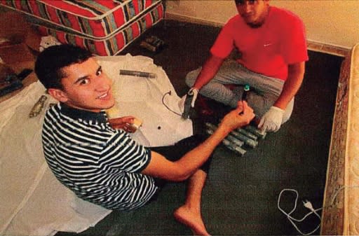 Younes Abouyaaqoub, left, prepares explosives before he drove a van through a crowd in Barcelona, killing 13 people