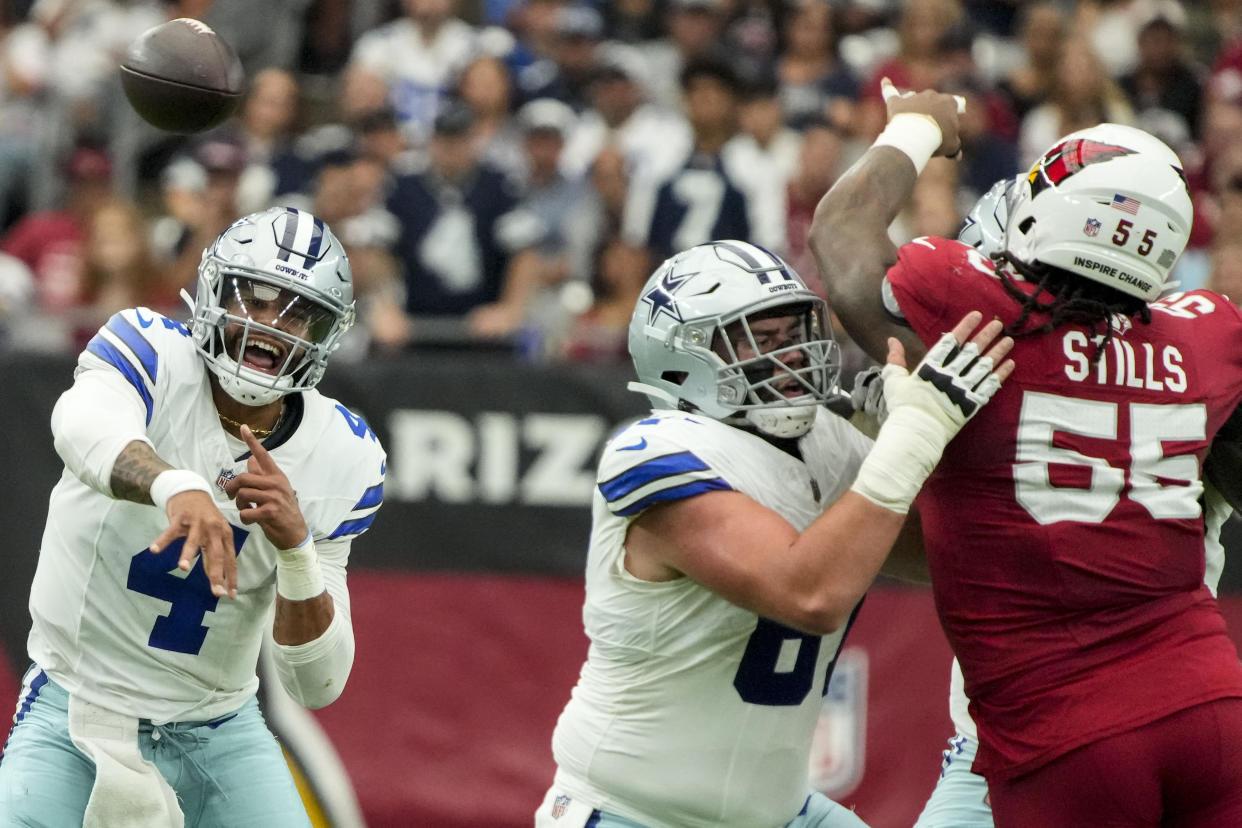 Many figured Dak Prescott (4) and the Cowboys could blow out the Cardinals. So far that's been anything but the case. (AP Photo/Rick Scuteri)
