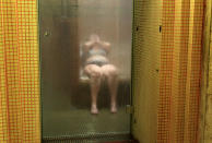 <p>A bather relaxes in a steam cabin at the Lukacs Bath in Budapest, Hungary on June 28, 2016. (REUTERS/Bernadett Szabo) </p>