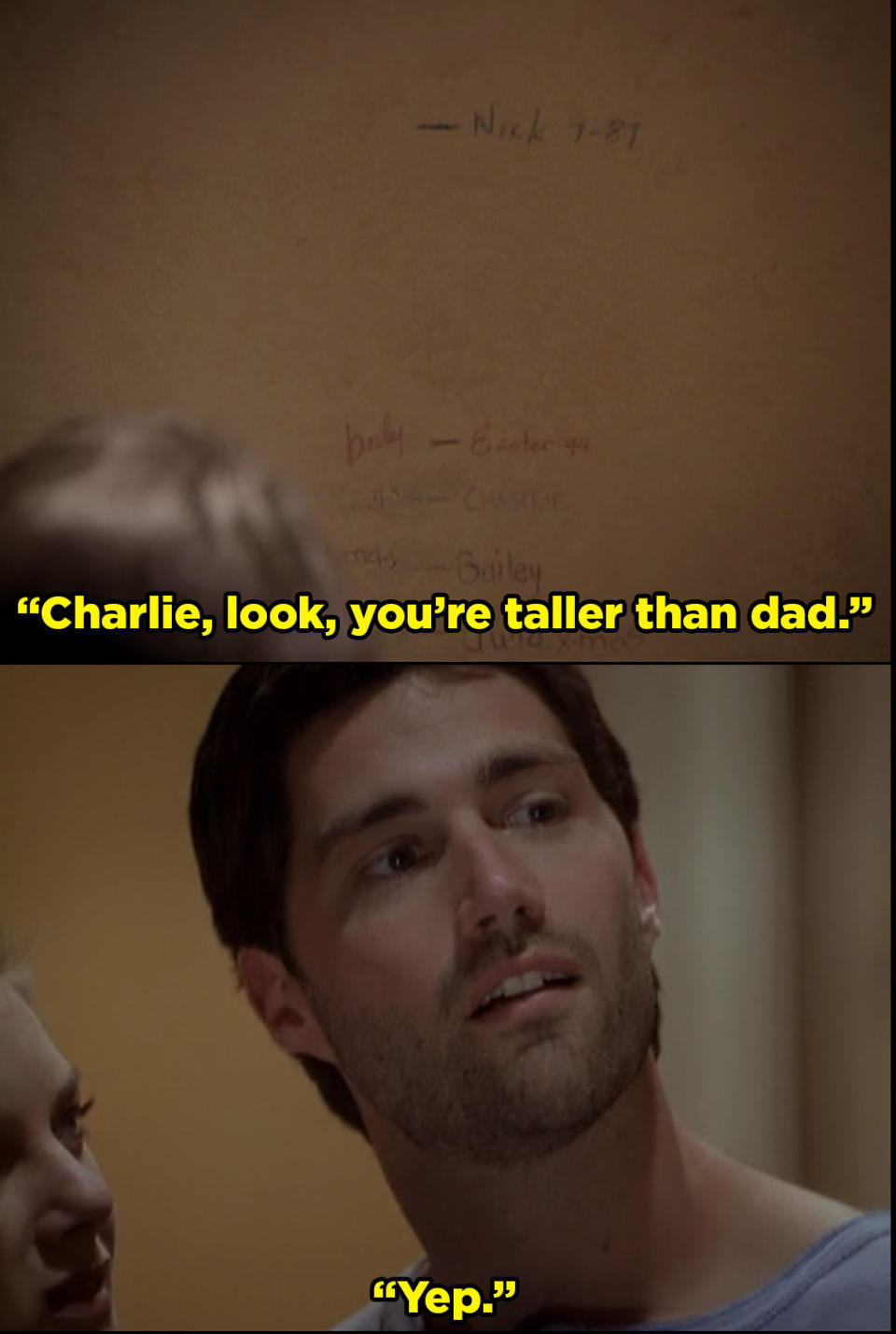 Charlie looks at the wall markings as Claudia says, "Charlie, look, you're taller than dad" and he says, "yep"