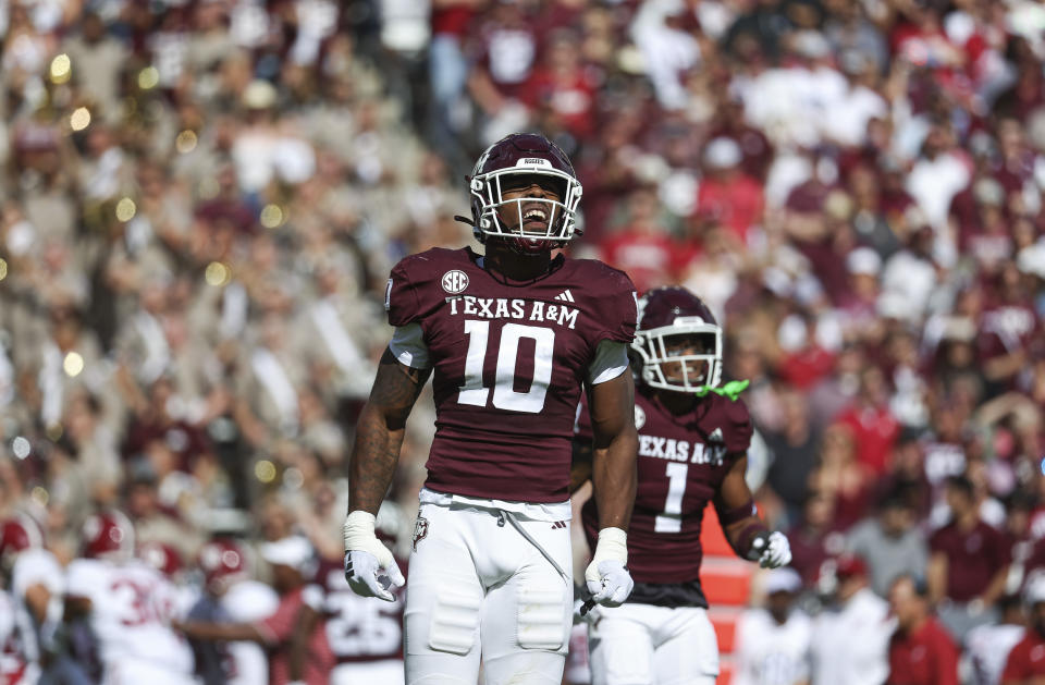 Oct 7, 2023; College Station, Texas; Texas A&M Aggies defensive lineman Fadil Diggs (10) celebrates after making a sack during the second quarter against the Alabama Crimson Tide at Kyle Field. Troy Taormina-USA TODAY Sports