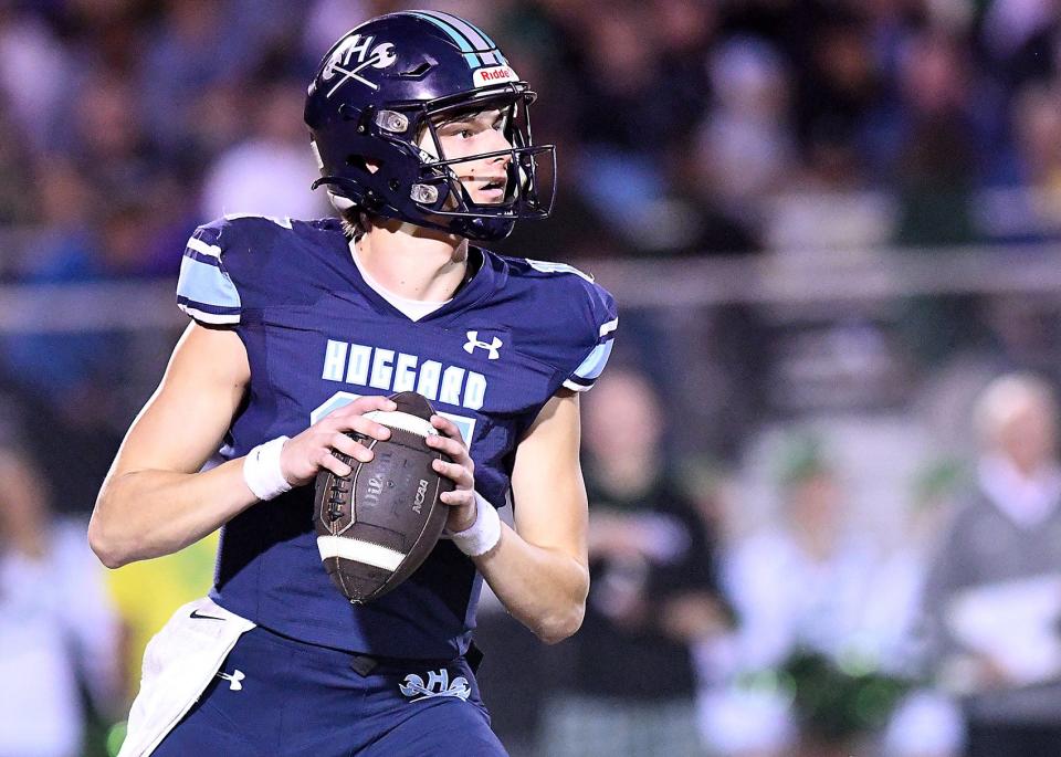 Hoggard's #15 Hudson Wilharm passes the ball as Hoggard took on Cardinal Gibbons in the 4A State Playoff Semi Final game Friday Dec. 1, 2023 at Hoggard's Scott Braswell Stadium in Wilmington, N.C. Hoggard won 41-20 to become the 2023 NCHSAA 4A East Champions. KEN BLEVINS/STARNEWS