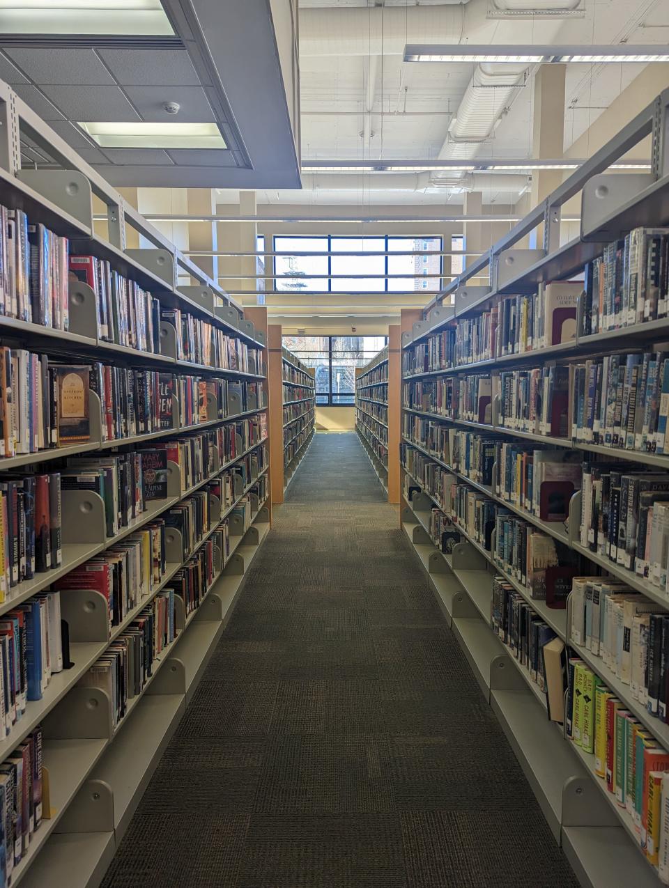 Bookshelves in the Pack Memorial Library in downtown Asheville on Jan. 27, 2023.