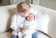 <p>Kisses! The young prince offers up a sweet smooch to Princess Charlotte.</p>