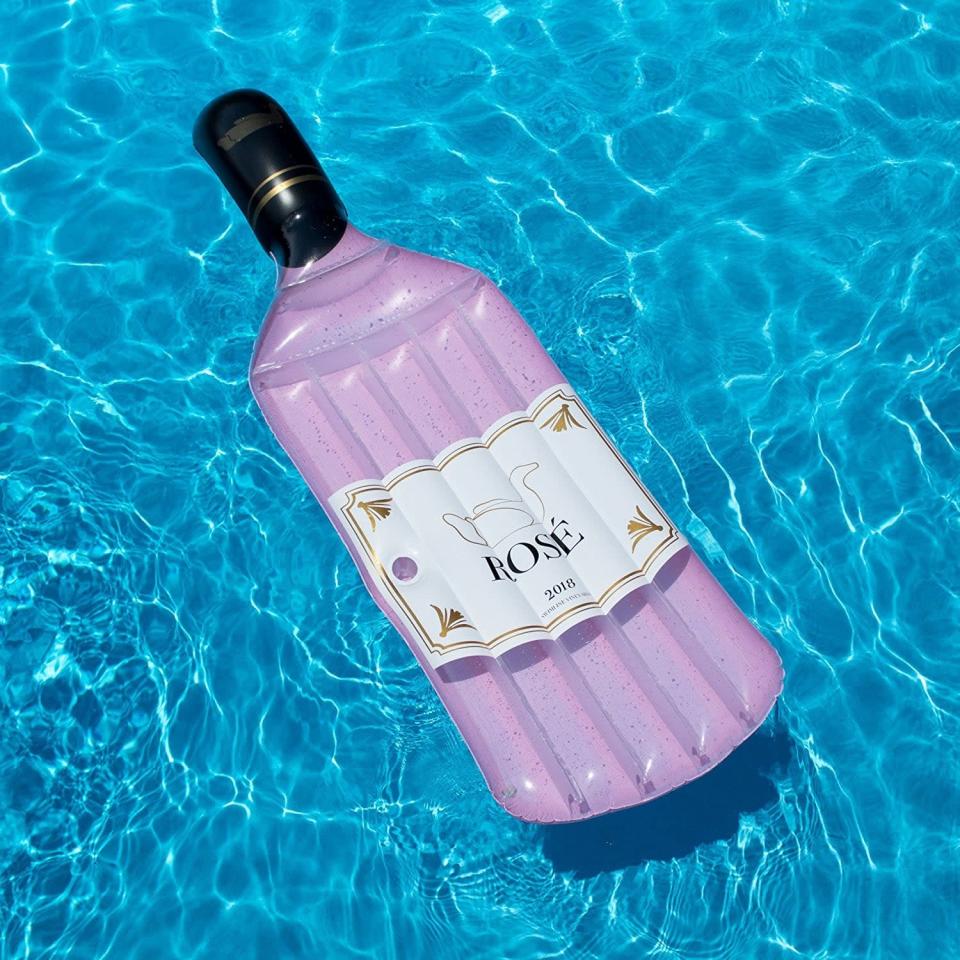 <p>If you live by Rosé all day, you need this <span>Rosé Wine Bottle Float</span> ($30, originally $45). It was made for pool photo shoots. It's long enough to fully stretch out your body for a relaxing floating experience.</p>