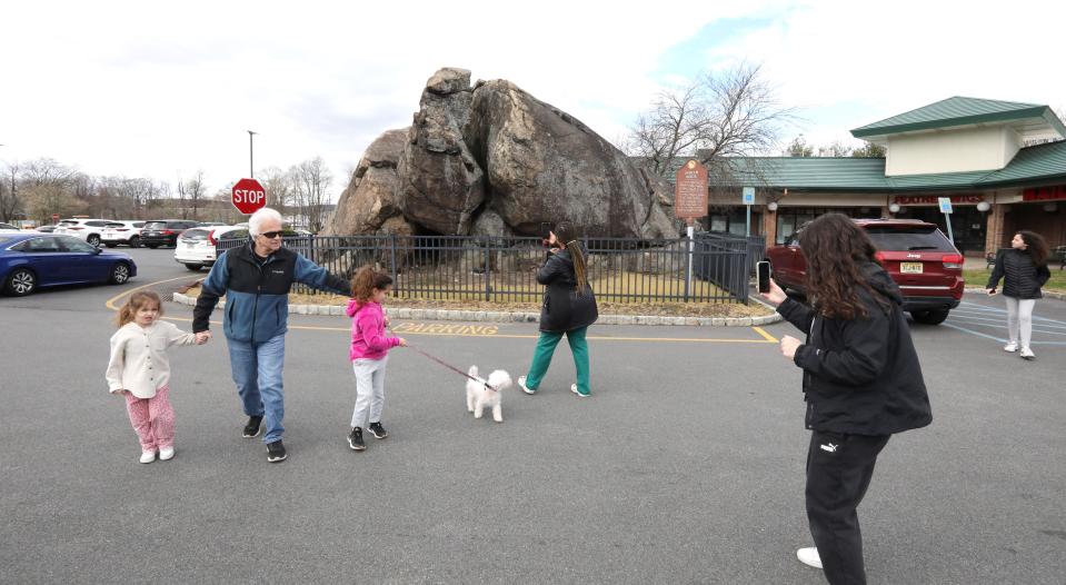 People came to see and take photos of Indian Rock in Suffern because of rumors that it had split in the morning during the earthquake April 5, 2024. It has always been split. Some think it might have split open a little further.