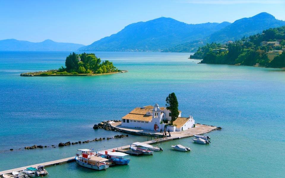 Corfu has an enticing mix of historical monuments, lush hillsides, blue skies, sand and pebble beaches and calm azure waters - AleksandarGeorgiev