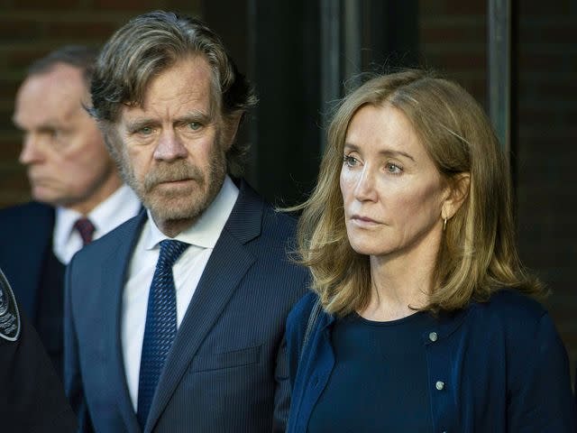 <p>Joseph Prezioso / AFP / Getty</p> (L-R) William H. Macy and Felicity Huffman at the John Joseph Moakley United States Courthouse in Boston on September 13, 2019.