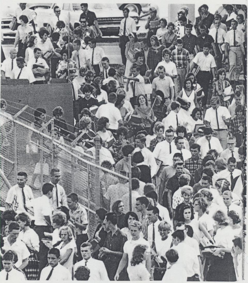 Sarasota High School students heading for a prep rally at Ihrig field, 1963.