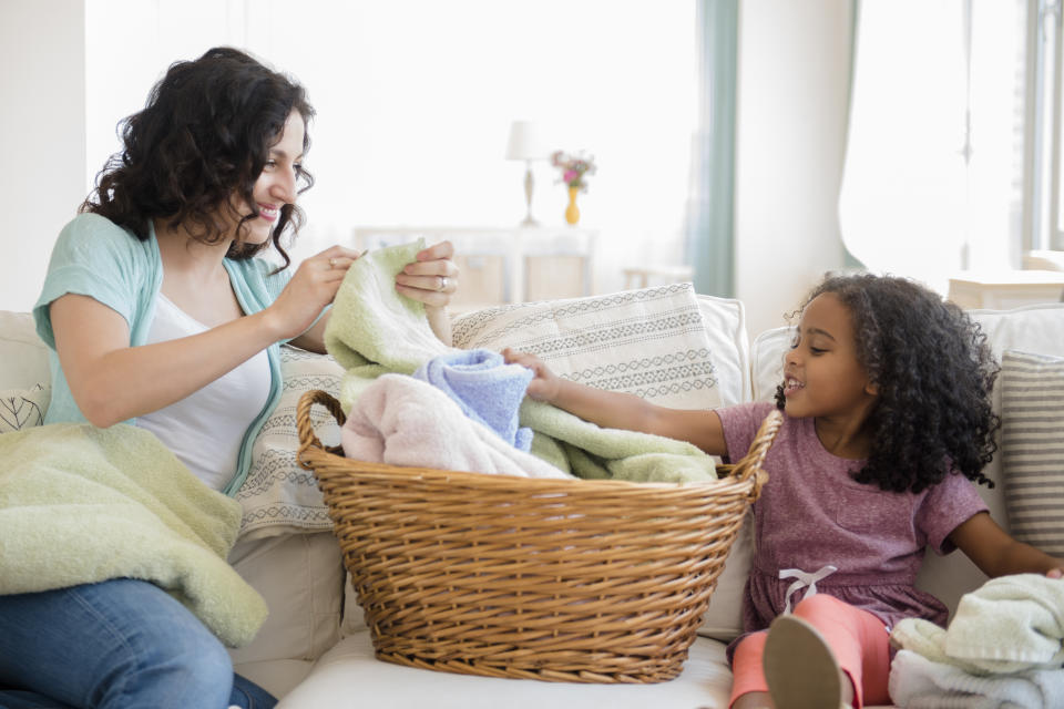 It's also important to include kids in discussions about handling household chores, in relation to their level of responsibility. (Photo via Getty Images)