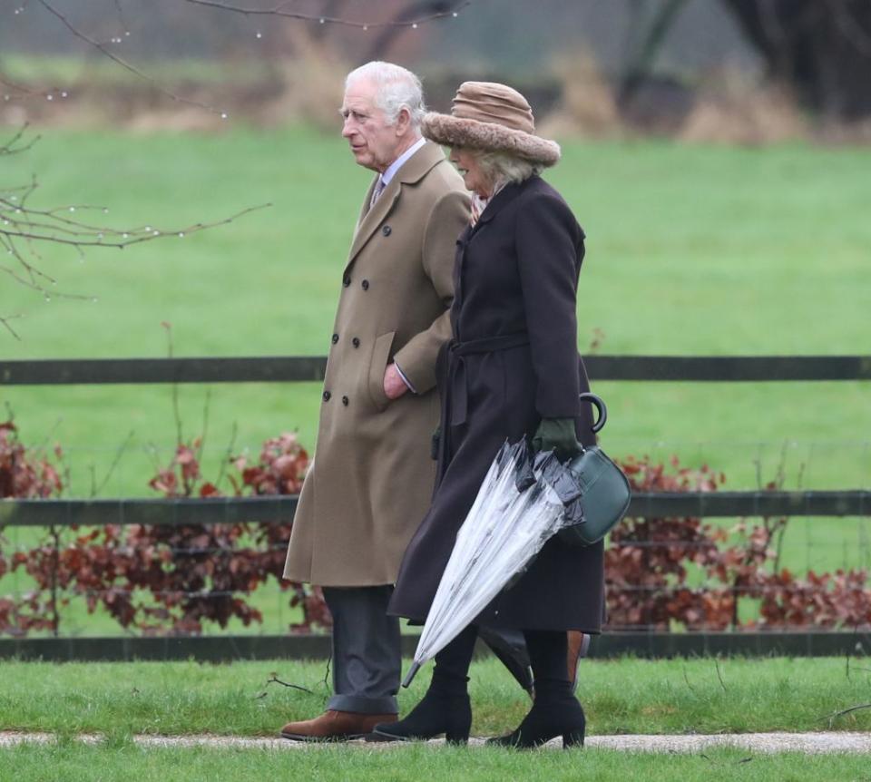 King Charles III and Queen Camilla walk to St Mary Magdalene Church at Sandringham House, UK on Feb. 18, 2024. Shutterstock