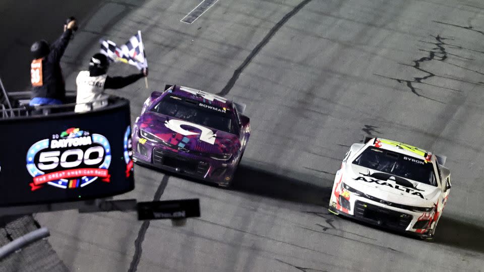 Byron (right) takes the checkered flag ahead of Bowman. - David Graham/AP