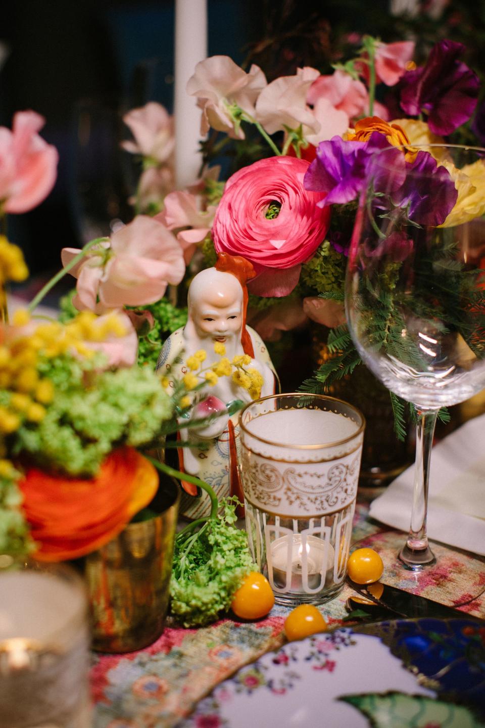 More fruit buffet. The florals were out-of-control gorgeous: table-top jungles of poppies and ranunculi the colors of Marni prints; towering skyscrapers of cherry blossoms everywhere; every element a showpiece.