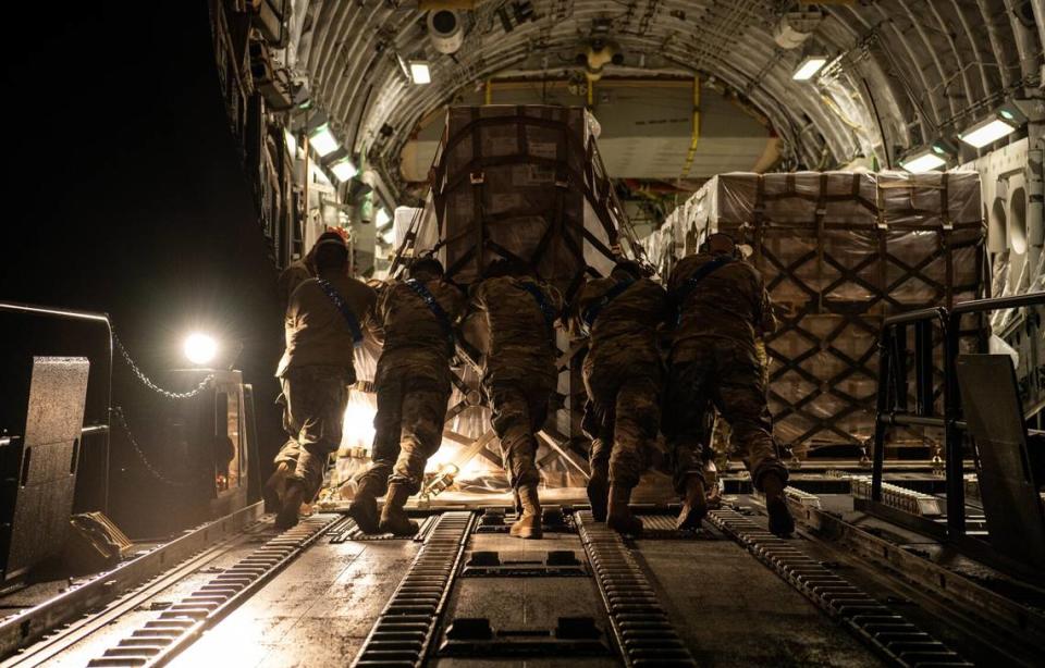 U.S. airmen load a pallet of infant formula onto a C-17 Globemaster lll aircraft at Ramstein Air Base, Germany. President Joe Biden launched Operation Fly Formula to speed up the importation of infant formula from Europe due to critical shortages.