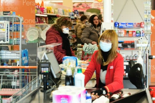 One supermarket in the quarantine area allowed 40 customers inside at a time and warned that the quantity of some products might be limited