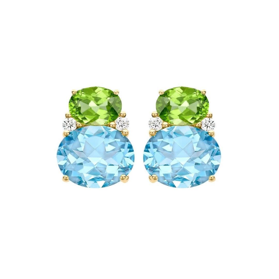 <p><a href="https://go.redirectingat.com?id=74968X1596630&url=https%3A%2F%2Fwww.kiki.co.uk%2Fproducts%2Fkiki-classic-peridot-and-blue-topaz-double-oval-studs-in-yellow-gold&sref=https%3A%2F%2Fwww.townandcountrymag.com%2Fsociety%2Ftradition%2Fa60669885%2Fkiki-mcdonough-royal-family-jewelry-interview-2024%2F" rel="nofollow noopener" target="_blank" data-ylk="slk:Shop Now;elm:context_link;itc:0;sec:content-canvas" class="link rapid-noclick-resp">Shop Now</a></p><p>Kiki Classics Peridot and Blue Topaz Double Oval Studs</p><p>kiki.co.uk</p><p>£1700.00</p>