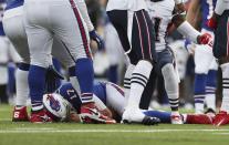 Buffalo Bills quarterback Josh Allen lies injured on the field after being tackled in the second half of an NFL football game against the New England Patriots, Sunday, Sept. 29, 2019, in Orchard Park, N.Y. (AP Photo/Ron Schwane)