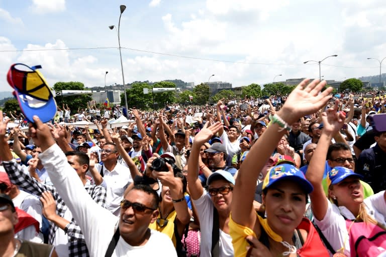 Venezuelan opposition activists demonstrate against President Nicolas Maduro, in Caracas, on April 24, 2017