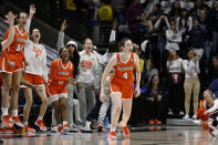 Syracuse players react to a basket by guard Sophie Burrows (4) in the second half of a second-round college basketball game against UConn in the NCAA Tournament, Monday, March 25, 2024, in Storrs, Conn. (AP Photo/Jessica Hill)