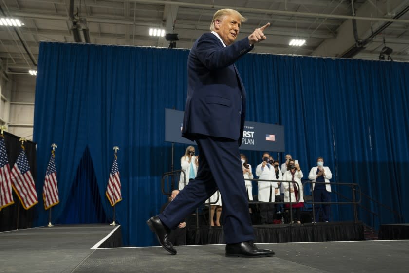 President Donald Trump arrives to deliver remarks on healthcare at Charlotte Douglas International Airport, Thursday, Sept. 24, 2020, in Charlotte, N.C. (AP Photo/Evan Vucci)