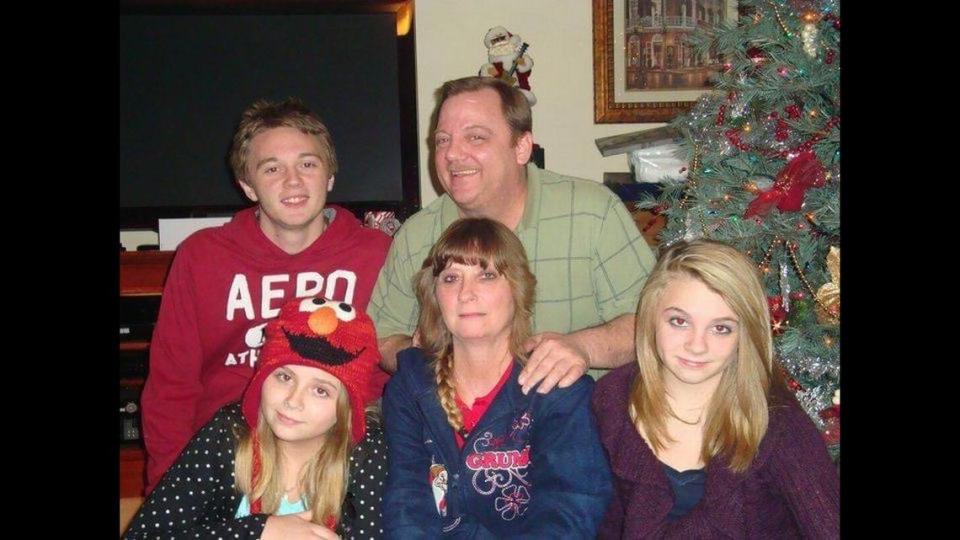 Karlie Langley, 27, in the lower right, and her family. She is shown with her brother, Travis; her father, Todd; her sister Katie; and her mother, Tammy.