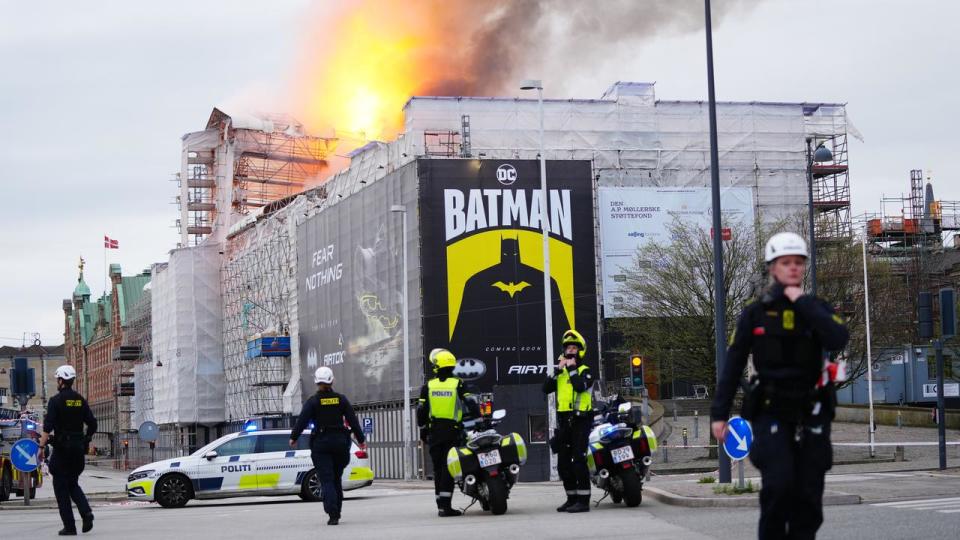 Fire and smoke rise out of the Old Stock Exchange in Copenhagen