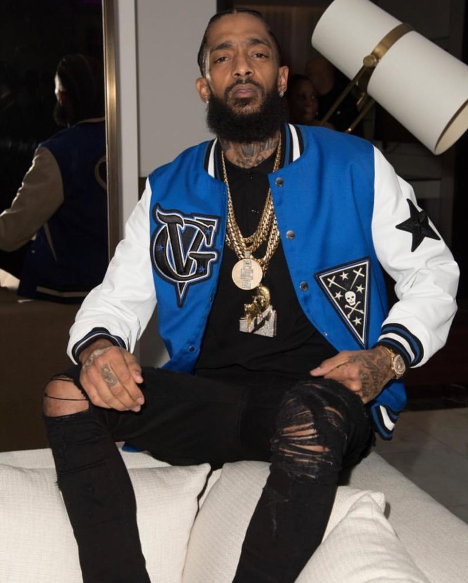 <p>Nipsey Hussle‘s death has shaken the hip-hop community to its core and tributes are continuing to pour in from star’s closest friends. It’s been nearly three days since his senseless slaying and prominent A-listers are still reeling his untimely death. Stars like Ashanti, T.I., Ice Cube and Future took time to gather their thoughts before sharing […]</p> <p>The post <a rel="nofollow noopener" href="https://theblast.com/nipsey-hussle-celebrity-reactions-tributes/" target="_blank" data-ylk="slk:Nipsey Hussle Tributes Continue to Pour in from Celebrity Friends Following Death;elm:context_link;itc:0;sec:content-canvas" class="link ">Nipsey Hussle Tributes Continue to Pour in from Celebrity Friends Following Death</a> appeared first on <a rel="nofollow noopener" href="https://theblast.com" target="_blank" data-ylk="slk:The Blast;elm:context_link;itc:0;sec:content-canvas" class="link ">The Blast</a>.</p>