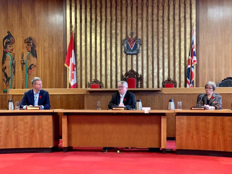 New Victoria mayor Marianne Alto (centre), and councillors Stephen Hammond (left) and Marg Gardiner (right), at their inaugural meeting on Nov. 3. (Kathryn Marlow/CBC - image credit)