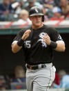 Chicago White Sox's Andrew Vaughn celebrates after scoring on a single by Leury Garcia during the sixth inning of a baseball game in Cleveland, Sunday, Sept. 26, 2021. (AP Photo/Phil Long)