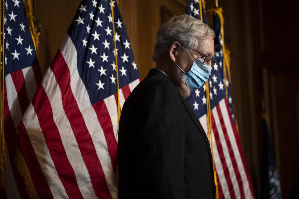 Senate Majority Leader Mitch McConnell of Ky., arrives for a news conference with other Senate Republicans on Capitol Hill in Washington, Tuesday, Dec. 15, 2020. (Caroline Brehman/Pool via AP)